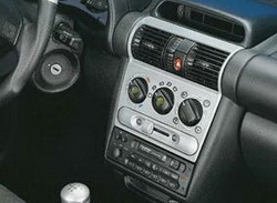 Комплект отделки приборной панели и салона Opel Corsa B, Opel Tigra в стиле Alu-Look для машин без отопления сидений, с электрозеркалами без электроподъемников стекол