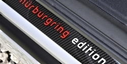 Накладки на пороги Opel Astra H в стиле Carbon-Optik с надписью “Nurburgring Edition”